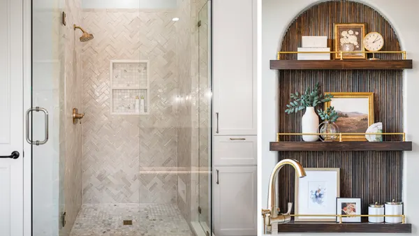 Glass shower with herringbone tile, next to the arched niche