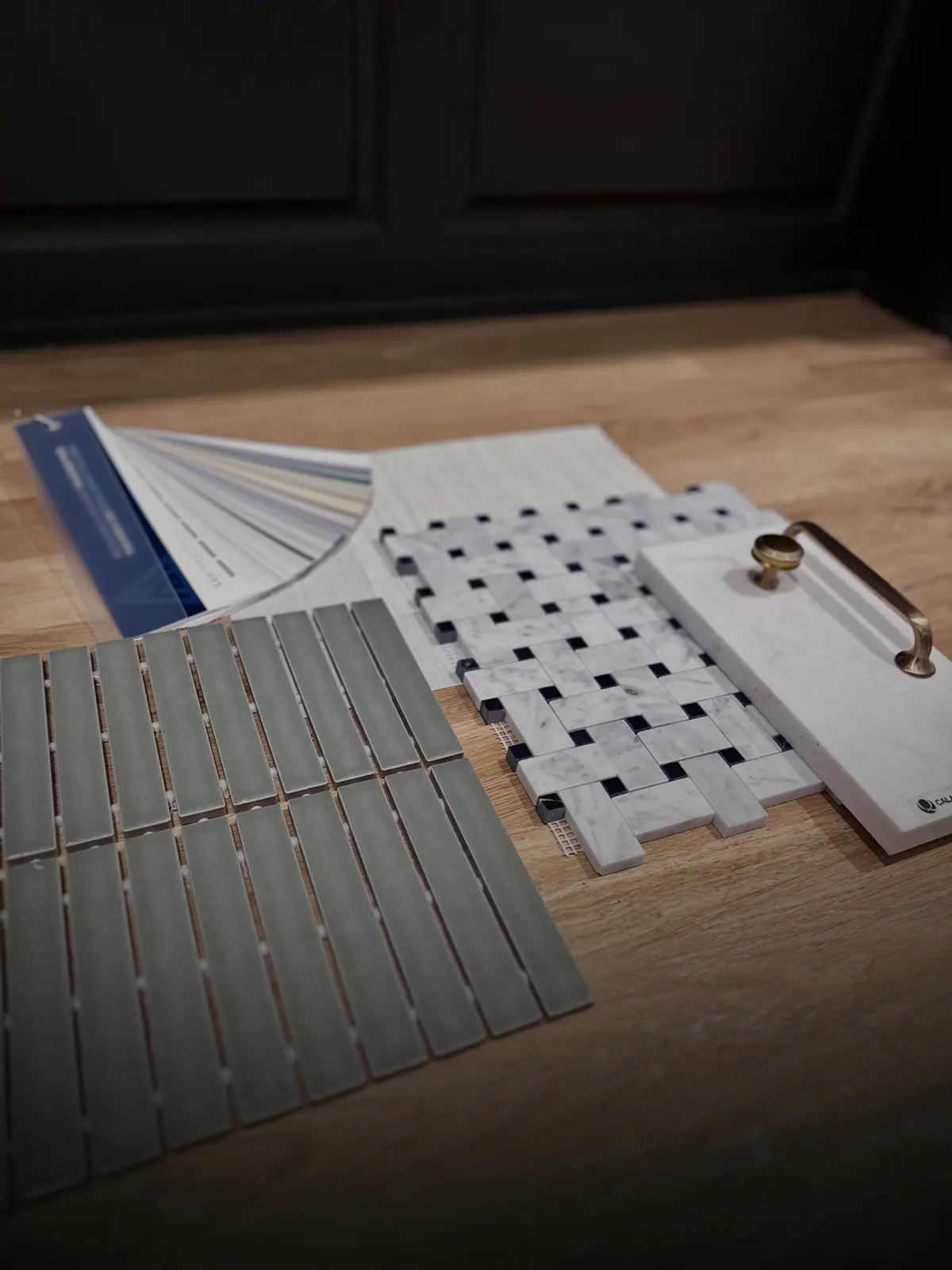Tile and finish samples laid out for a design selection meeting